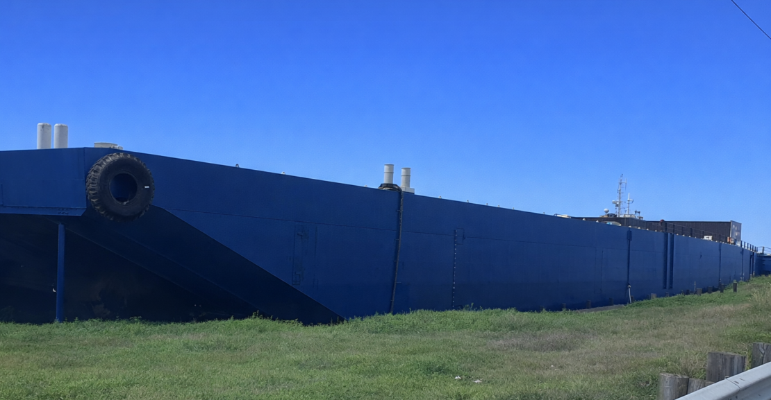 Flat Deck Barge tied up